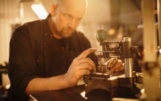 Machinist Checking Workpiece for Accuracy