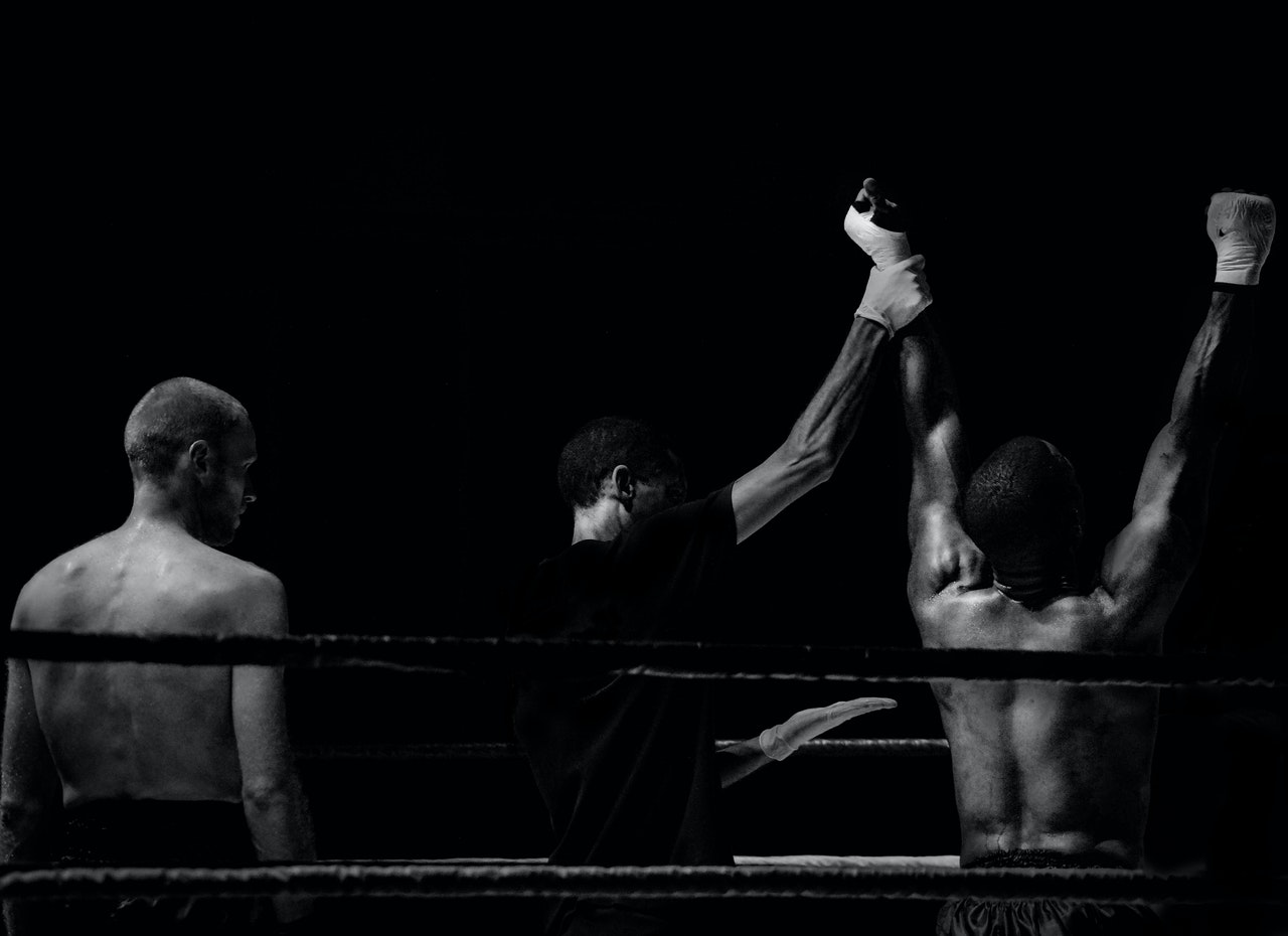 Arms raised of a boxer in victory